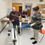 Gerald Fongemie (left) introduces the first step for creating the Grosses Têtes by cutting chicken wire with student Jonna Boure (right) on November 9, 2021. (Emily Jerkins | St. John Valley Times)