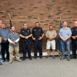 FORT KENT, Maine -- July 11, 2022 -- Two new police officers, Mark Belanger and Daniel Plourde have joined the Fort Kent Police Department. The new officers were recognized at a Monday, July 11 town council meeting. From left, are, Suzie Paradis, Fort Kent town manager; councilman Joey Ouellette, councilman Corey Pelletier, council chair Jake Robichaud, Officer Daniel Plourde, Officer Mark Belanger, councilman Andrew Caron, councilman Carrol Theriault, Chief Michael DeLena, and Sgt. Garrett Albert. (Courtesy of Stacy Belanger)