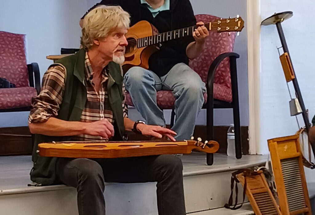 Historic Patten building reopens with a jam session - The County